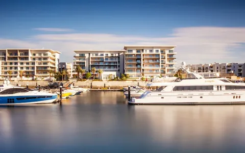 Marina and residential buildings at Al Mouj Muscat, from the official development website